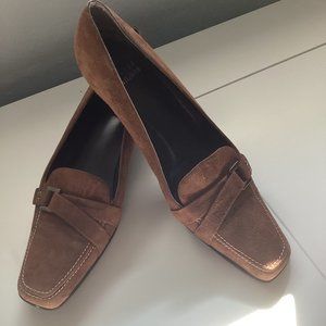 Stuart Weitzman women’s brown shoes.